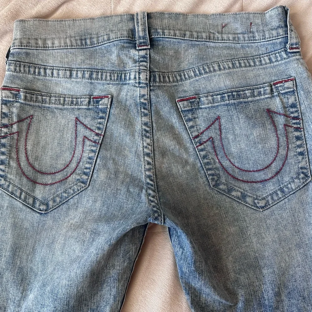 True Religion jeans pockets red